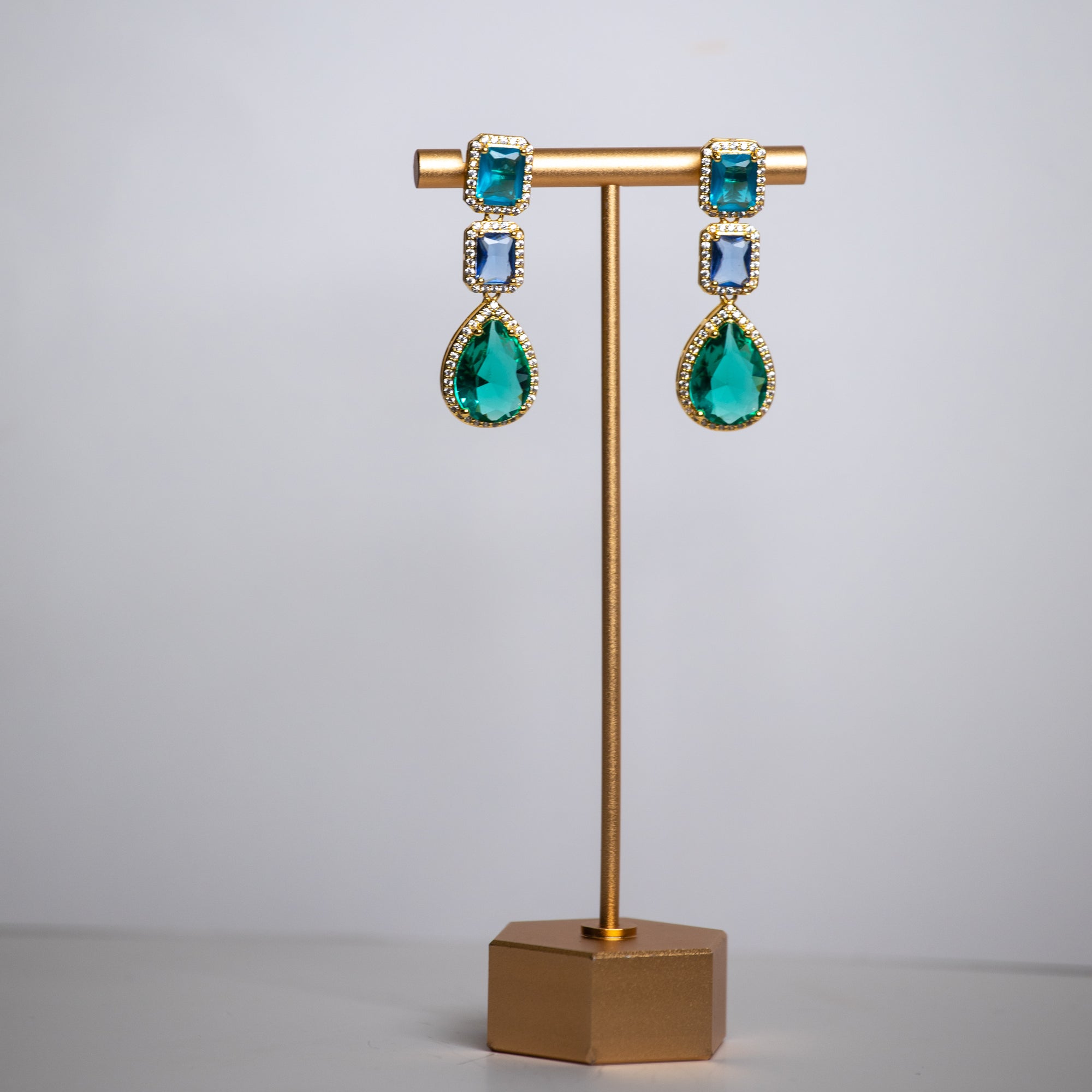 Long ,tear drop design cubic zirconia fashion earrings .